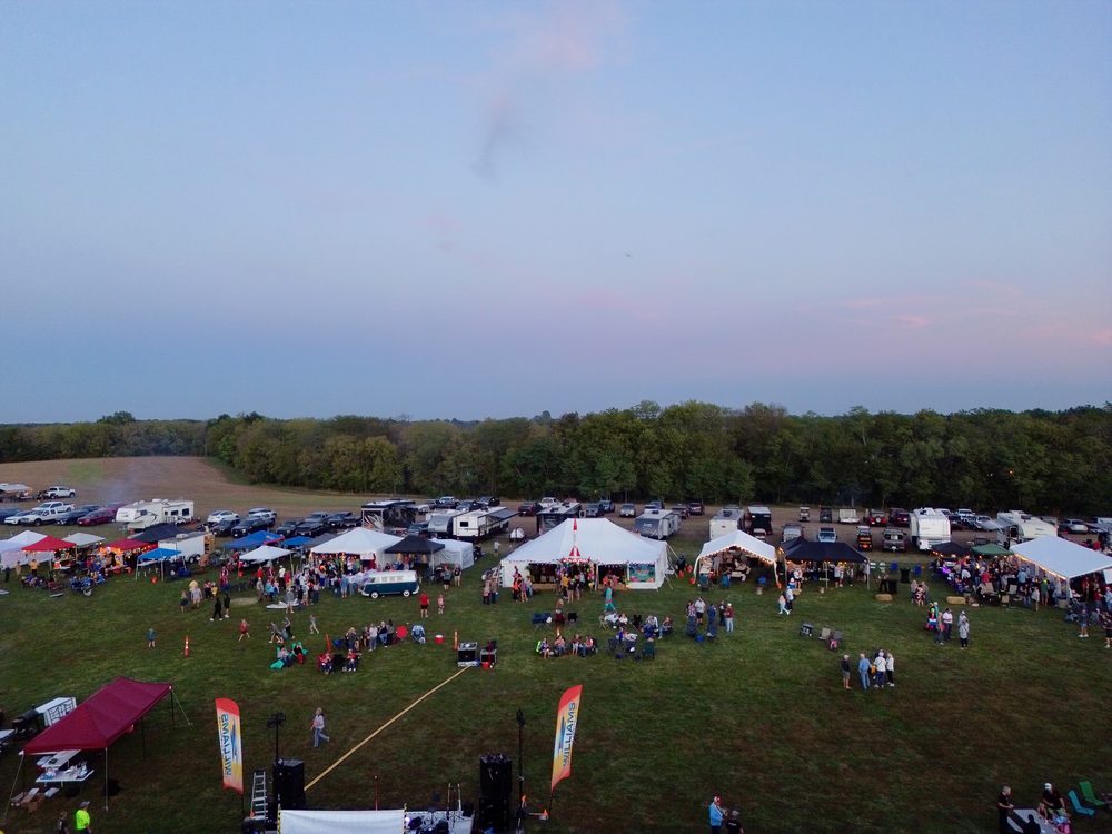 Golden hour at a community gathering near Lake Lotawana
