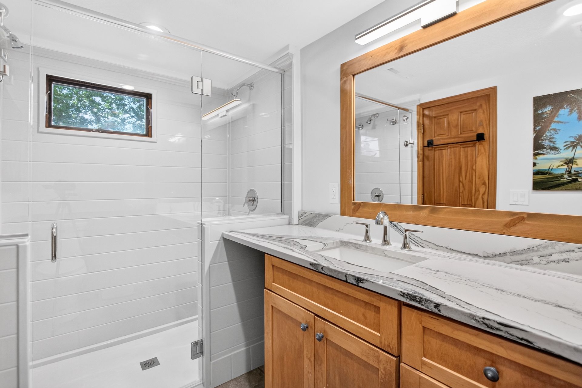 Bathroom with marble-look quartz vanity at 31 H Street, Lake Lotawana