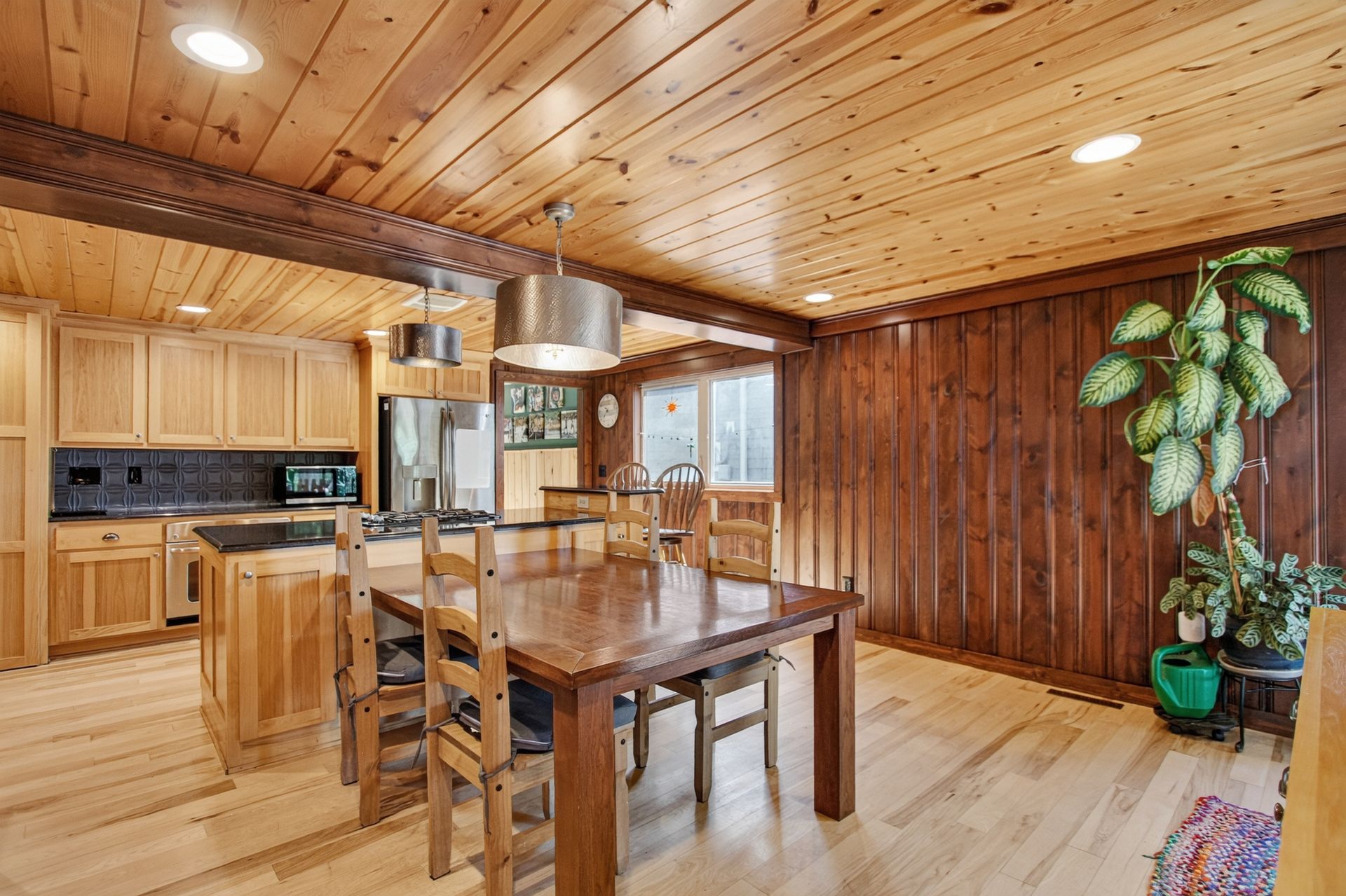 Dining area with a view into the kitchen at 31 H Street, Lake Lotawana