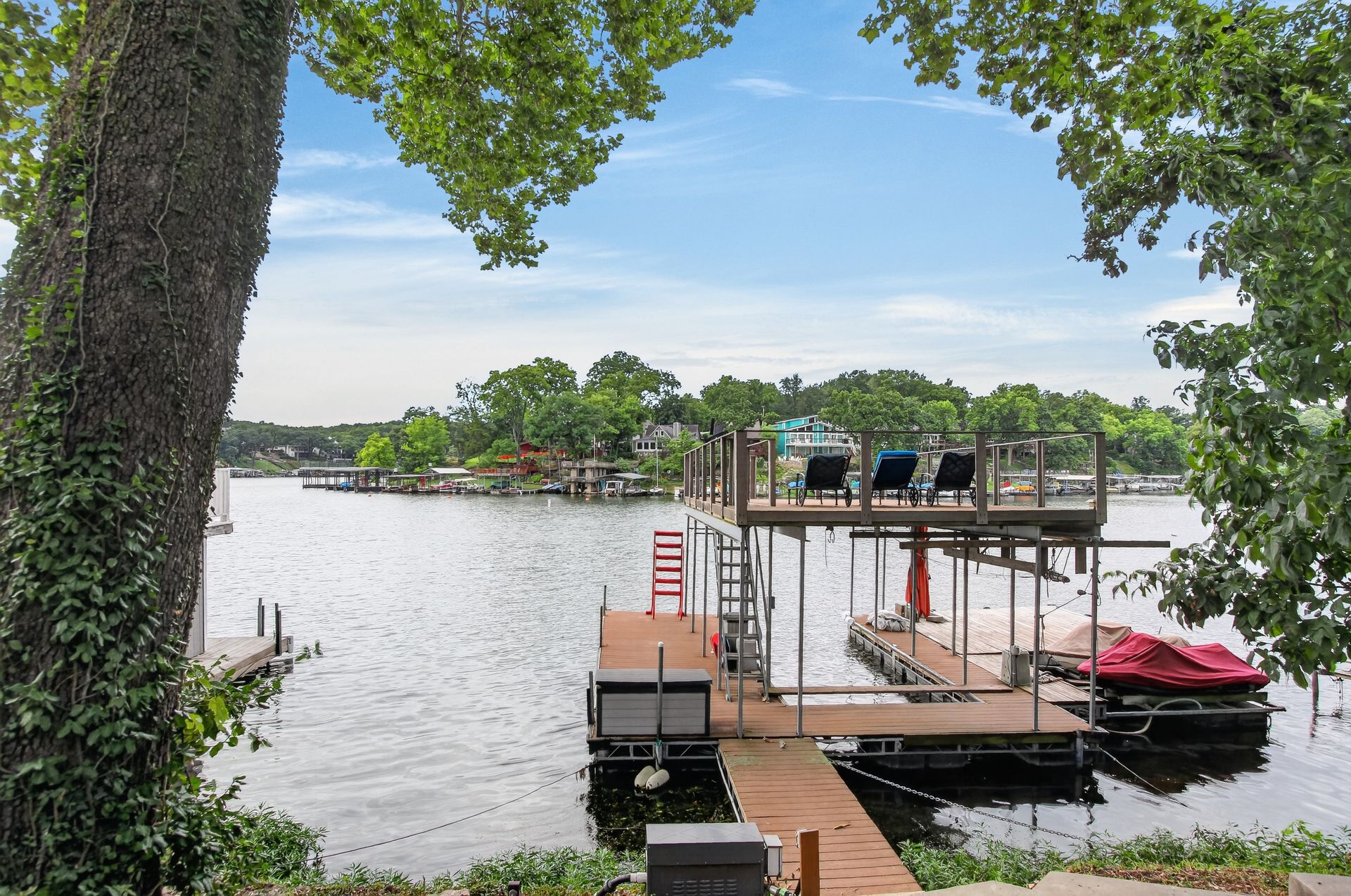 Dock with upper sundeck and jet ski storage at 31 H Street, Lake Lotawana