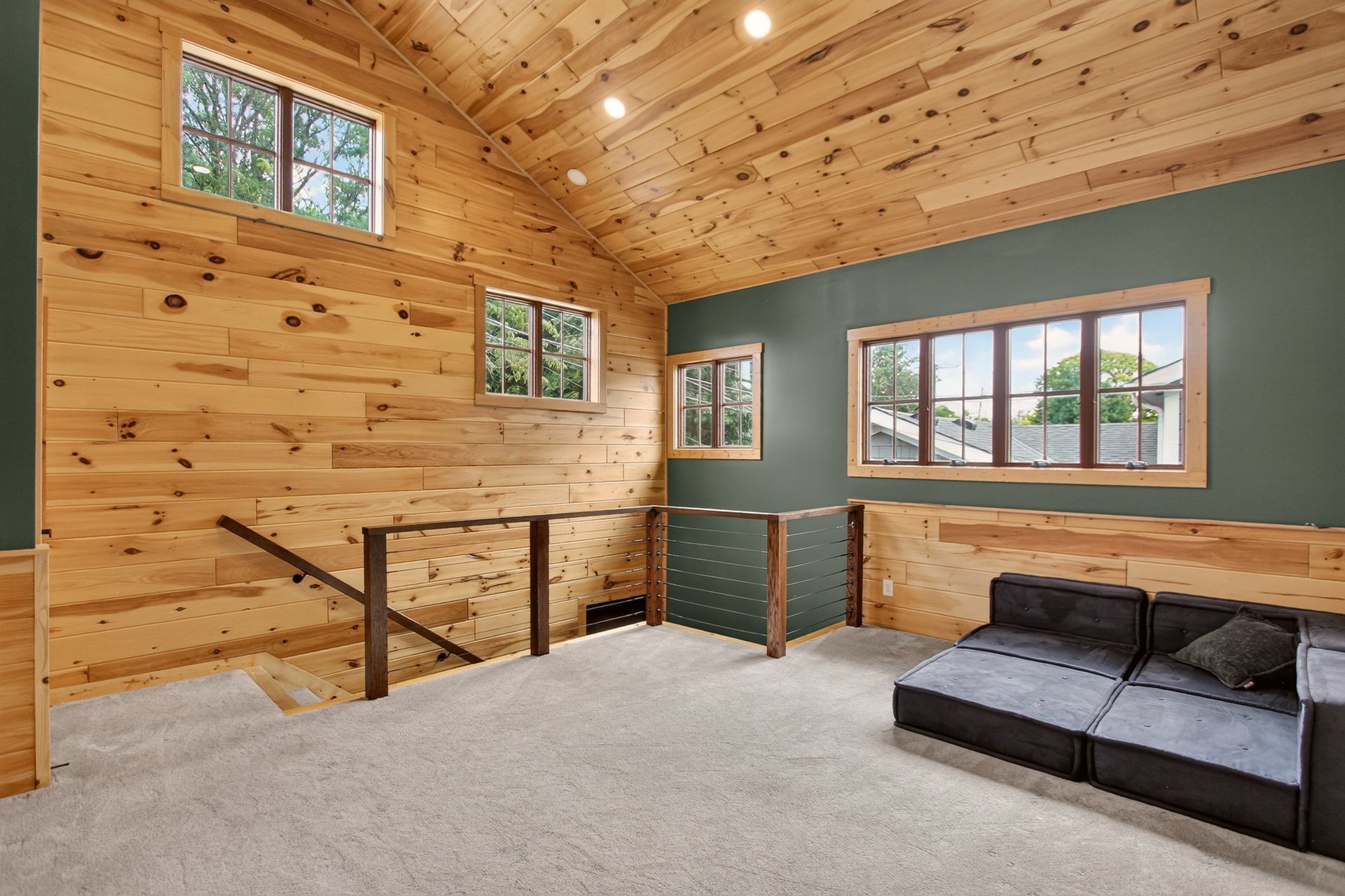 Upstairs landing and staircase with lake-facing windows at 31 H Street, Lake Lotawana